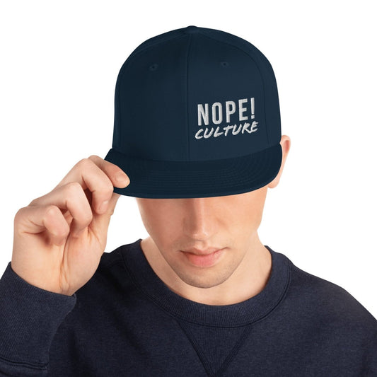 Man wearing NOPE! Culture hat