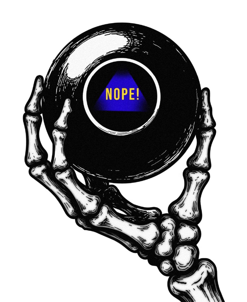 Close up of magic 8 ball logo sat in a skeleton hand