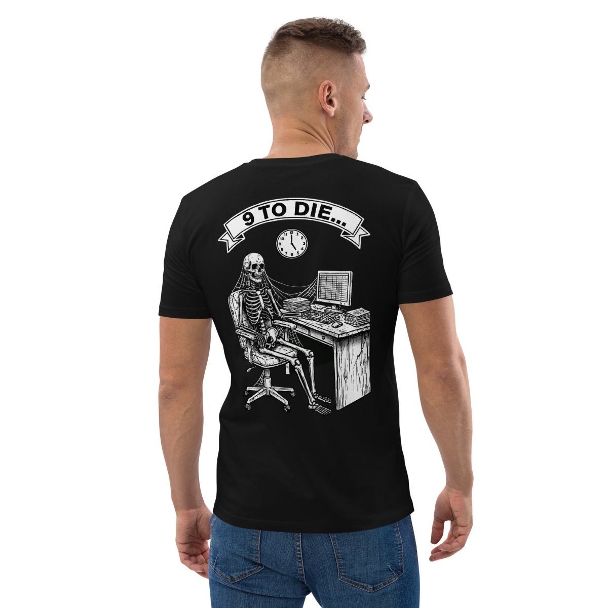 man wearing Black cotton NOPE! Culture T-Shirt with white 9 to Die graphic print, standing with his back.