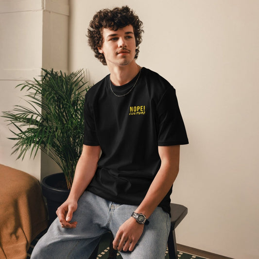 Male model wearing Black NOPE! Culture T Shirt