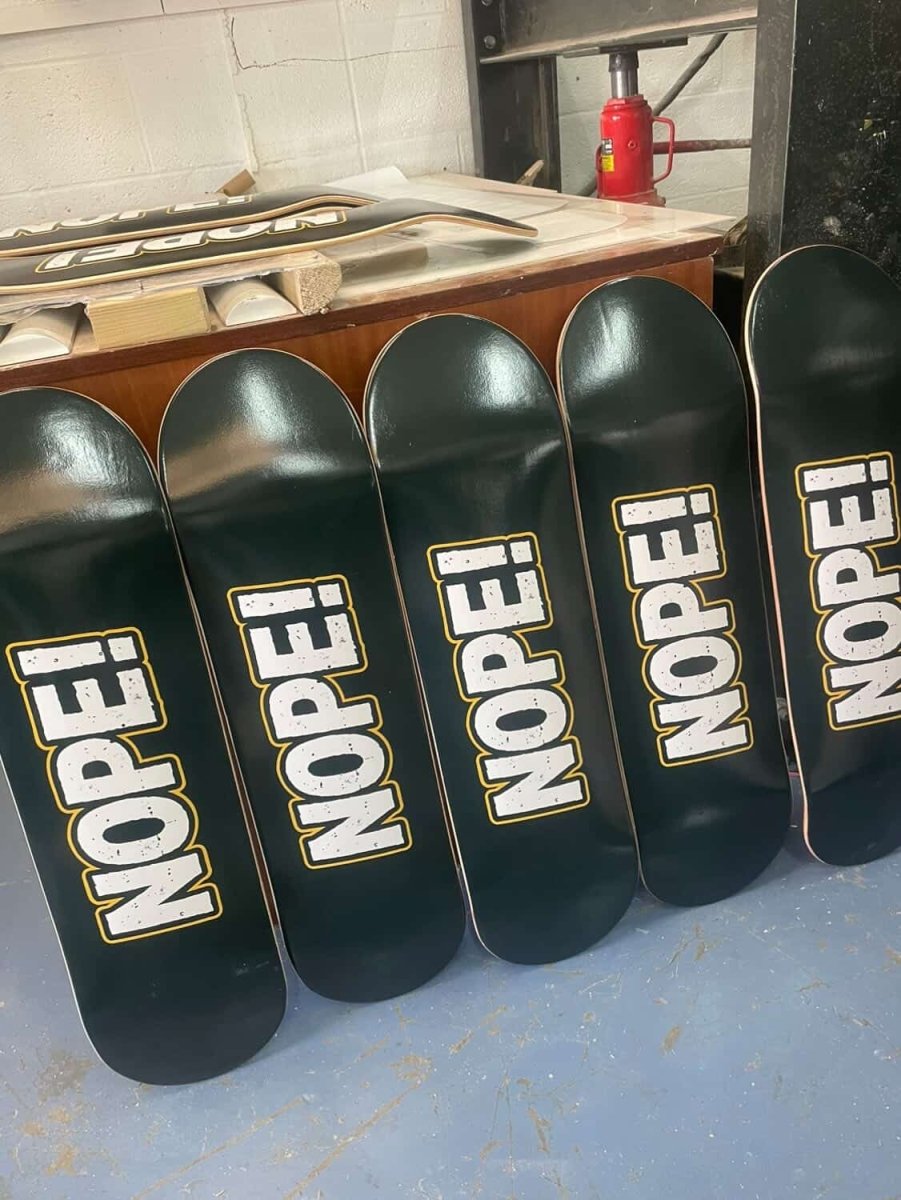 5 NOPE! Skateboards in a row